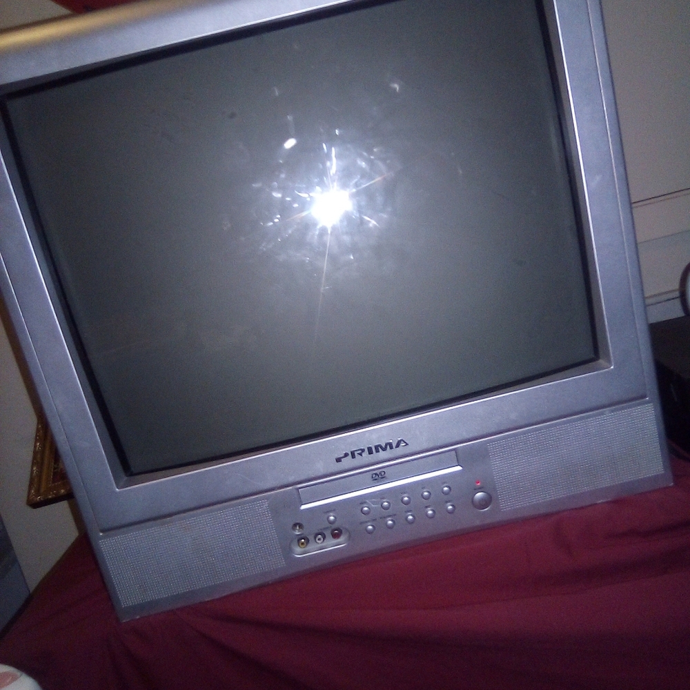 TV an remote with DVD on it